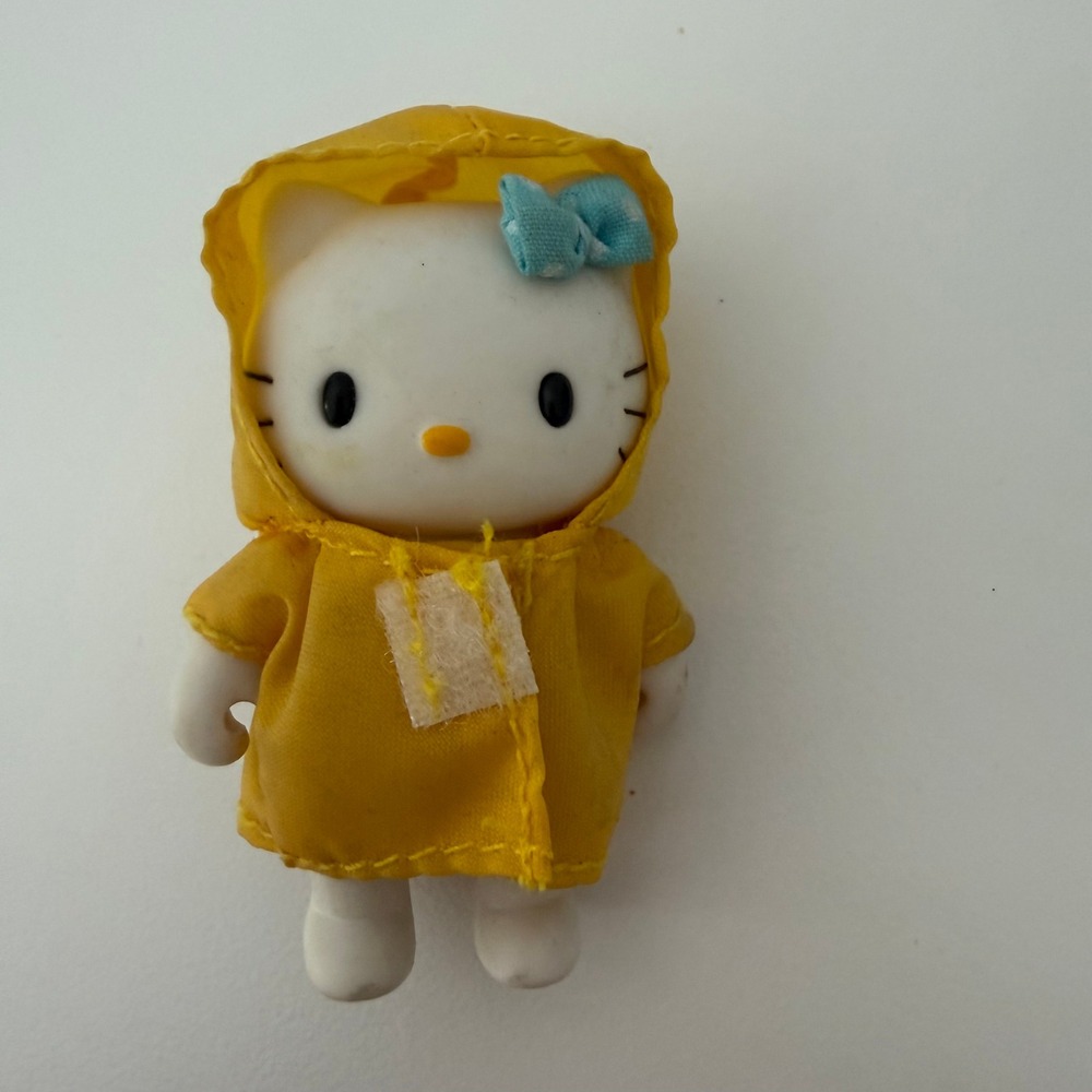 Vintage 2003 Sanrio Hello Kitty Bandai Action Figure Yellow Raincoat 2.5 Inch
